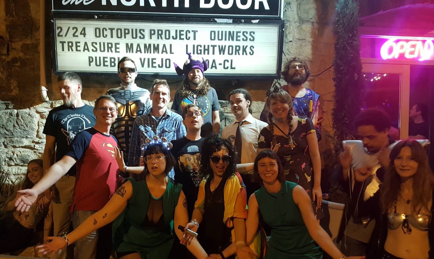 Ouiness on the marquee at The North Door, Austin TX, with the full band out front